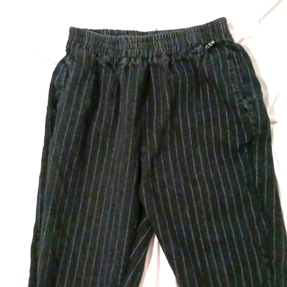 Pin stripped black pants.